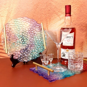 Detailed view of DIY resin trays with honeycomb texture and gold metal handles