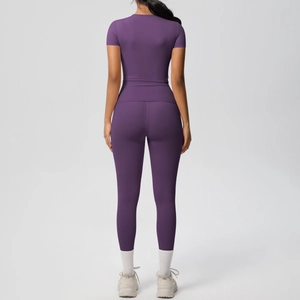 Detail view of the back of purple two-piece yoga set showing high-waist fit and fabric texture