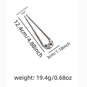 Detailed view of U-shaped hair stick with dimensions 12.4cm in length and 19.4g weight