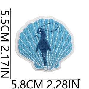 Detailed dimensions of blue shell-shaped embroidery patch with white embroidered edges
