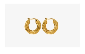 Macro detail of 18K gold plated twisted rope textured thick hoop earrings