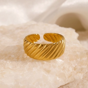 Adjustable gold plated stainless steel croissant ring with textured diagonal patterns