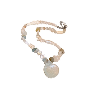 Beaded necklace with shell starfish and pearls for seaside vacation style
