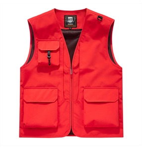 Detail of red outdoor vest showing metal zipper, 3D pockets, and breathable mesh lining