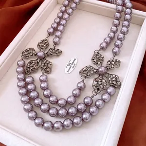 Double-layer lavender pearl necklace with vintage hollow flower rhinestone pendants