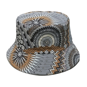 Detailed close-up of bohemian geometric tribal patterns on a sun bucket hat fabric