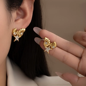 Starfish and seashell gold titanium steel earrings featuring white rhinestone accents