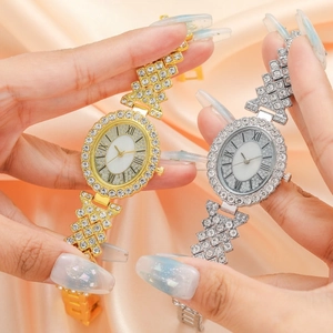 Luxurious gold and silver oval watches for women with sparkling rhinestones and metal band