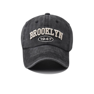 Vintage washed black cotton baseball cap featuring white Brooklyn 1947 3D embroidery