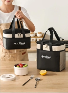 Detail of insulated meal bag with reinforced handles, mesh side pocket and dual zippers