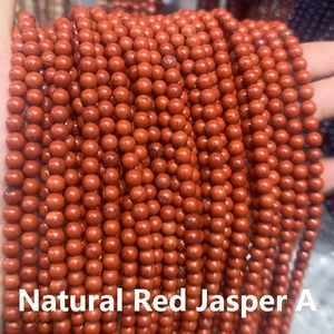 Macro shot of 8mm natural red jasper stone beads for DIY jewelry making accessories
