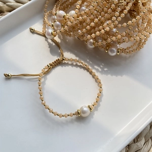Bohemian freshwater pearl and champagne crystal beaded bracelet with adjustable cord