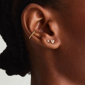 S925 silver heart zircon stud and gold ball clip earring set on female model ear
