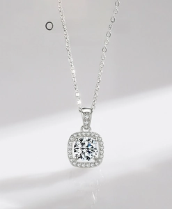 Close-up of S925 sterling silver cushion pendant necklace with pavé-set round zircon