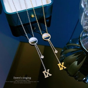 Titanium steel necklace with shell inlay, Roman numerals and tassel pendant in gold and silver