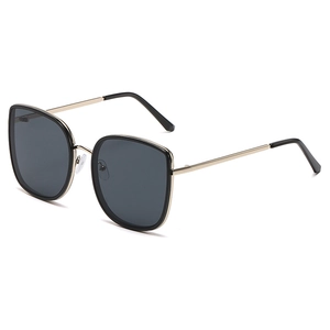 Classic oversized square sunglasses for women with black lenses and gold metal frames
