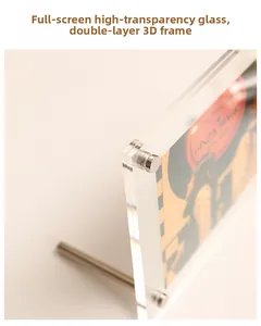 Side macro view of clear double-layered glass photo frame with silver metal support bar