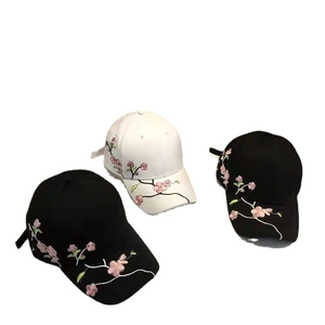Vintage floral embroidered baseball caps in black and white styles for outdoor sun protection