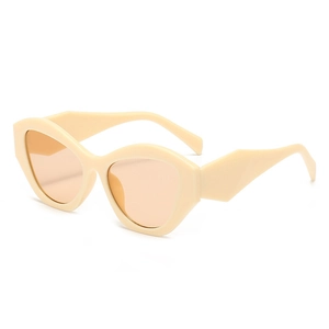 Chic oversized geometric cat-eye sunglasses in cream beige with amber tinted lenses