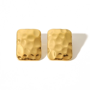 Detailed view of gold rectangular stud earrings with a textured hammered finish for women
