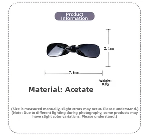 Detail view of black bow hair clip with acetate material specs and 7.6cm size dimensions