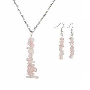 Detail of pink natural crystal stone necklace and earrings set with silver-tone hooks
