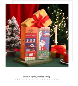 Christmas gift bag and gold boxes set with Santa illustration and red ribbon bow