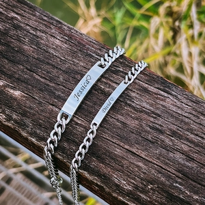 Customized couple bracelets with personalized names on polished stainless steel cuban chains