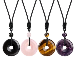 Natural crystal donut pendants featuring obsidian pink quartz tiger eye and amethyst