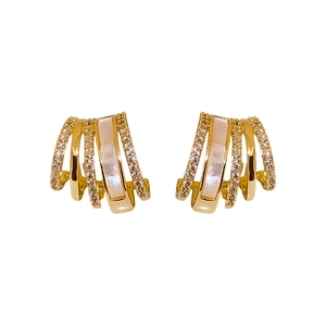 Gold plated C-shape multi-row earrings featuring sparkling cubic zirconia and mother of pearl