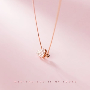 Elegant s925 silver heart necklace in rose gold with pavé-set zircons and chain