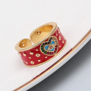Adjustable red enamel ring with gold evil eye heart and micro-pave zirconia stones