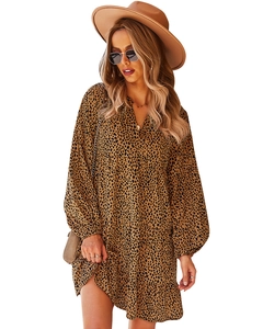 Detail of V-neck leopard print dress with lantern sleeves and ruffle hemline