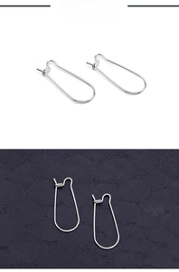 Macro shot of minimalist silver titanium steel long U-shaped DIY earring hook findings