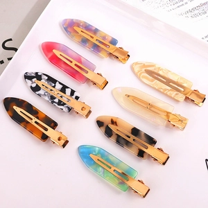 Set of 8 colorful cellulose acetate hair clips with stylish tortoiseshell and marble patterns