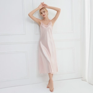 Pink silk V-neck nightgown with lace trim and slim straps in an elegant long style