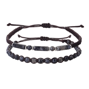 Detailed view of handmade stone bracelets with amethyst tiger eye beads and woven cord