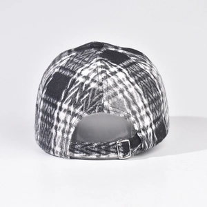 Back view of black and white plaid baseball cap with adjustable metal strap buckle