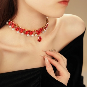 Vintage style choker with red rubies and white pearls in a golden setting for women