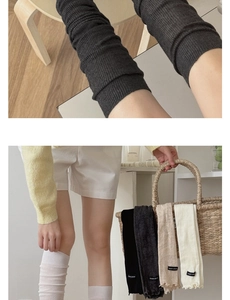 Detail of knitted leg warmers with ribbed cuffs and subtle ruffle hem in four colors
