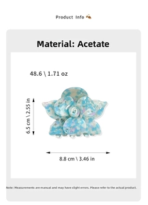 Detail of floral acetate hair claw clip showing blue pattern and dimensions 8.8x6.5cm