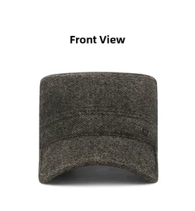 Front view of brown herringbone flat top military cap with fleece lining and metal badge