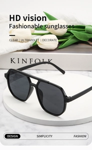 Detail of matte black oversized aviator sunglasses with high-definition polarized lenses