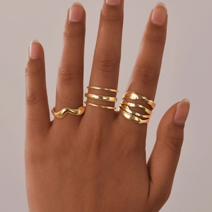 Three-piece gold plated stainless steel wavy stackable rings set for women