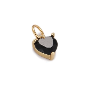 Gold-plated heart pendant with black faceted zircon gemstone on white background