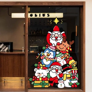 Christmas window stickers with Santa, Reindeer and Snowman on a glass storefront