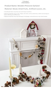 Detail of handmade rustic Christmas pinecone garland with wooden stars on white mantel