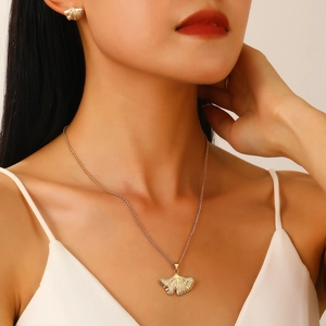 Golden ginkgo leaf necklace and earring set for women with minimalist maple leaf design