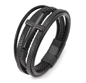 Close-up of black multilayer leather bracelet with a metal cross and magnetic clasp