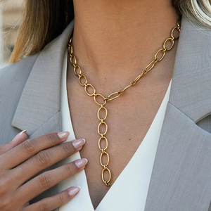 Minimalist 18k gold plated titanium steel Y-shaped chain necklace worn on a model
